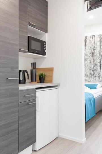 Фото номера Двухместный номер с 2 отдельными кроватями Отель Oma Hotelli г. Ylöjärvi 11