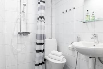 Фото номера Двухместный номер с 2 отдельными кроватями Отель Oma Hotelli г. Ylöjärvi 18